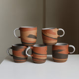 Three clay mug