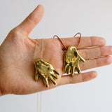 Gilded hand necklace