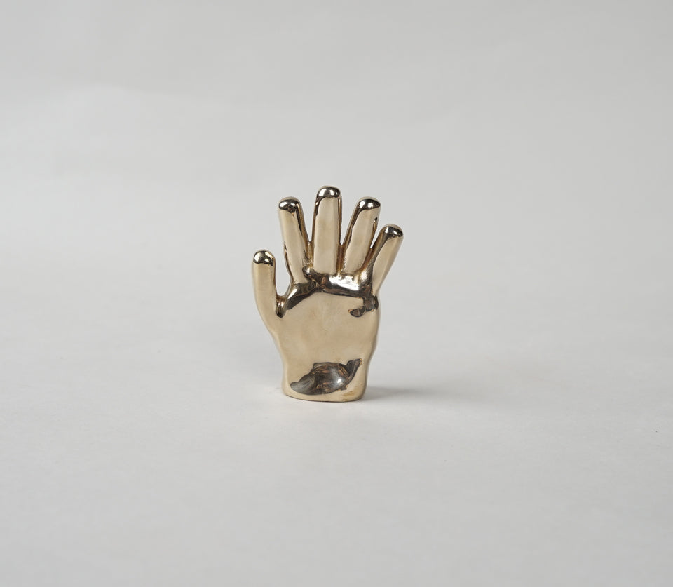 Gilded hand sculpture