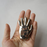 Gilded hand sculpture